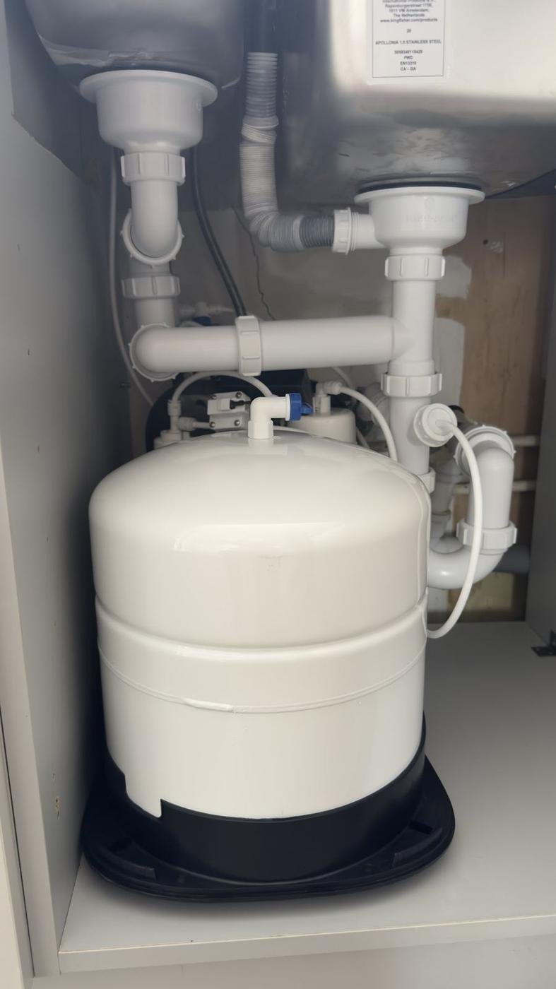 A water filter tank under a sink